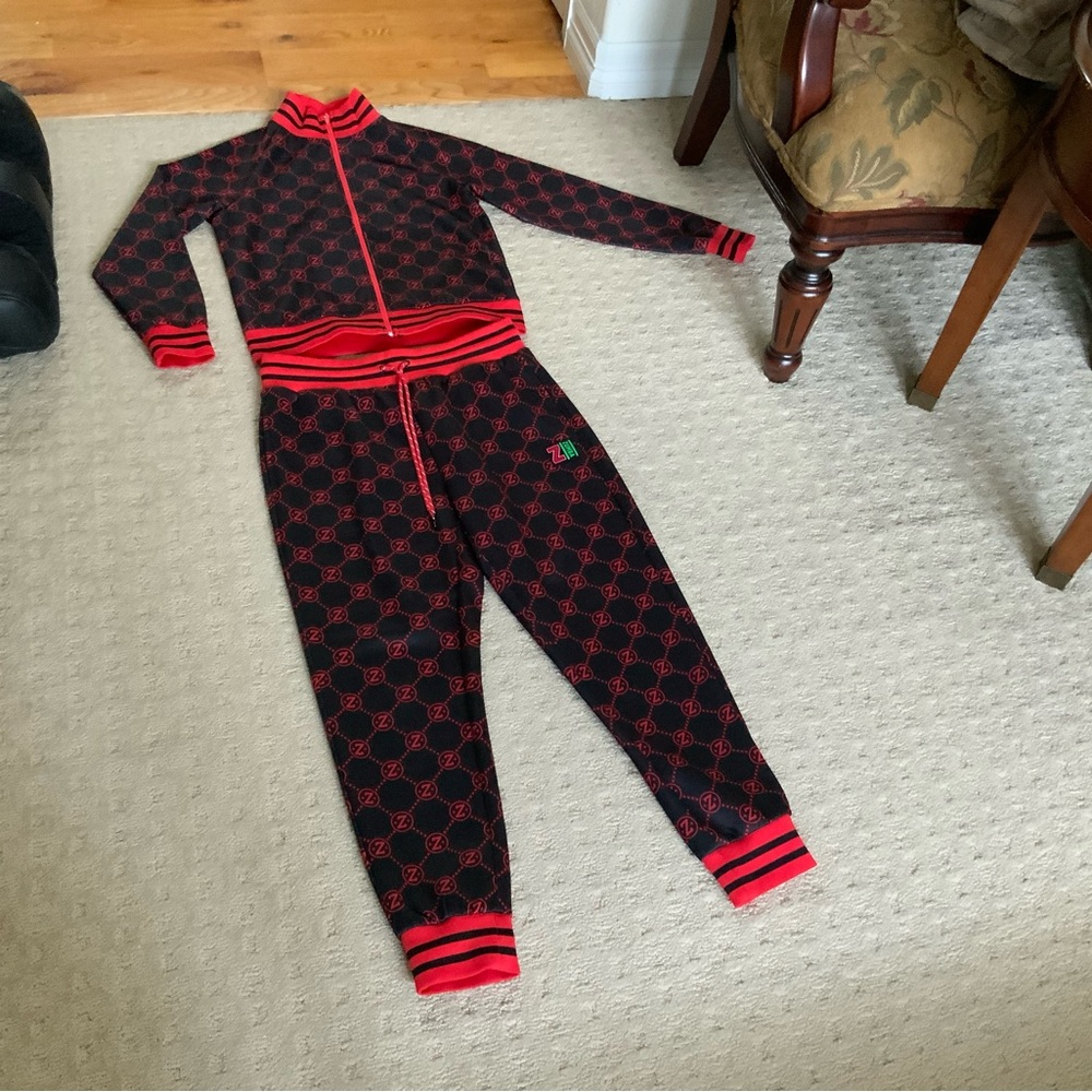 Striking Black and Red Pantsuit with Bold Accents